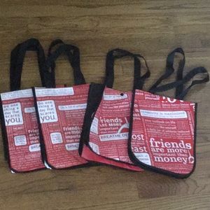 Lot of four (4) Lululemon red shopping bags
